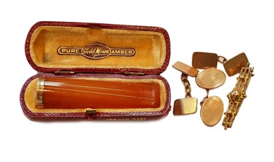 Lot 321 - A pair of 9 carat gold cufflinks; a single 9...