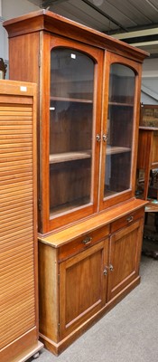 Lot 1204 - An early 20th century glazed bookcase cabinet,...