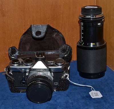 Lot 316 - Olympus camera and a lens