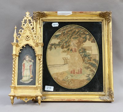 Lot 218 - A 19th century needlework of a lady in a verre...