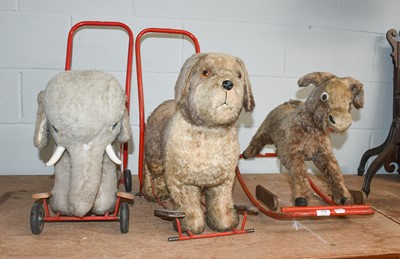 Lot 378 - Two push along plush toys, an elephant, and a...