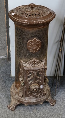 Lot 1124 - A French enamel stove, 85cm high