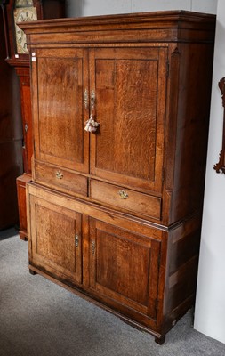 Lot 1235 - A George III oak press cupboard, 126cm by 54cm...