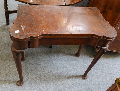 Lot 1243 - George III walnut fold over card table fitted...