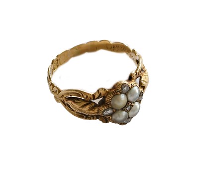 Lot 194 - An 18 carat gold diamond and split pearl ring,...