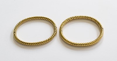 Lot 221 - A 9 carat gold hinged bangle; and another...