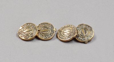 Lot 211 - A pair of 9 carat gold 'Manx' cufflinks