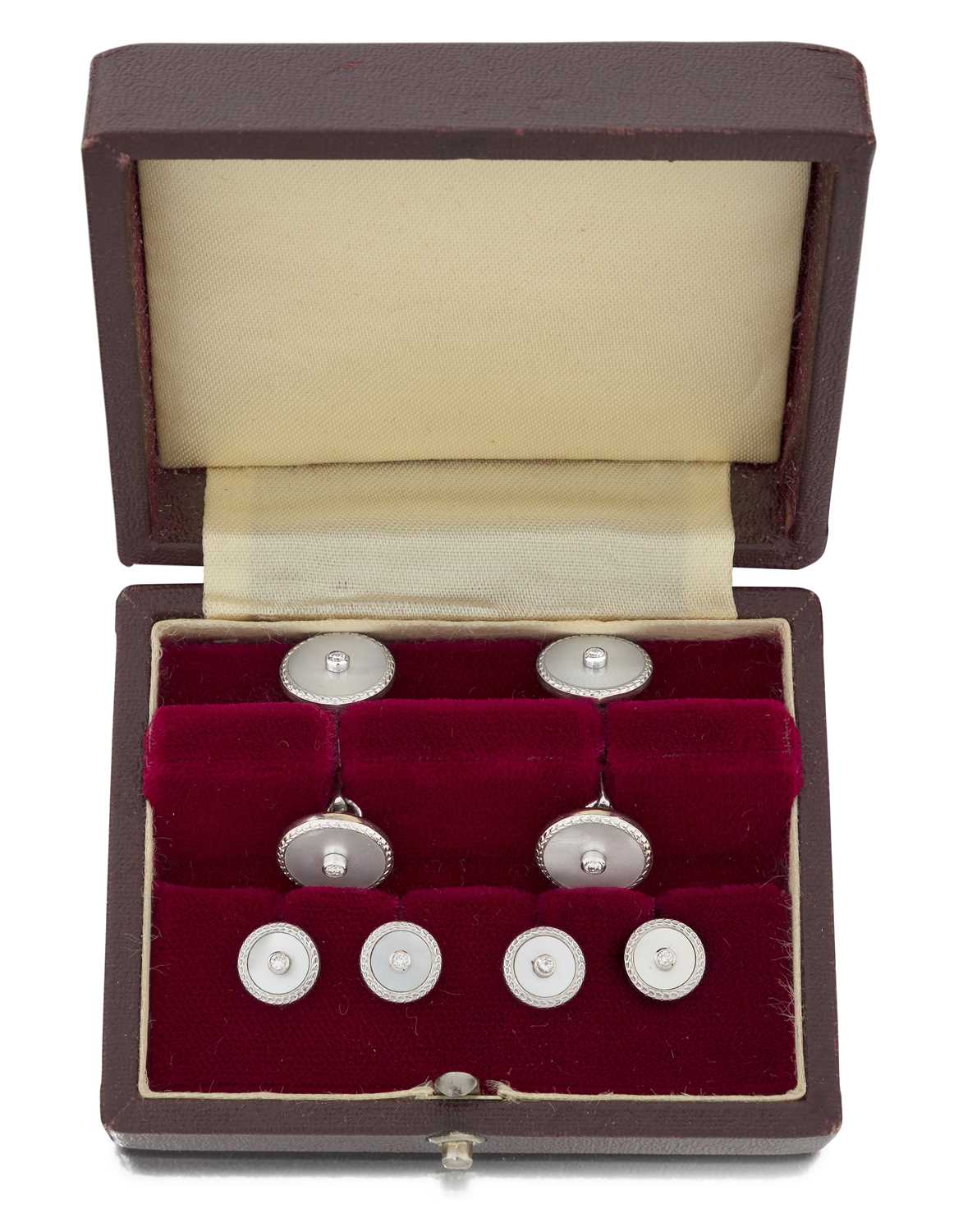 Lot 2176 - An 18 Carat White Gold Diamond and Mother-of-Pearl Dress Stud and Cufflink Suite