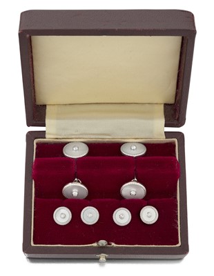Lot 2176 - An 18 Carat White Gold Diamond and Mother-of-Pearl Dress Stud and Cufflink Suite