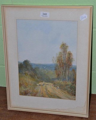 Lot 348 - F W Hines, a shepherd and his flock on a track, signed watercolour