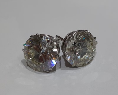 Lot 2350 - A Pair of Diamond Solitaire Earrings