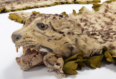 Lot 314 - Taxidermy: A Pair of Snow Leopard Skin Rugs...