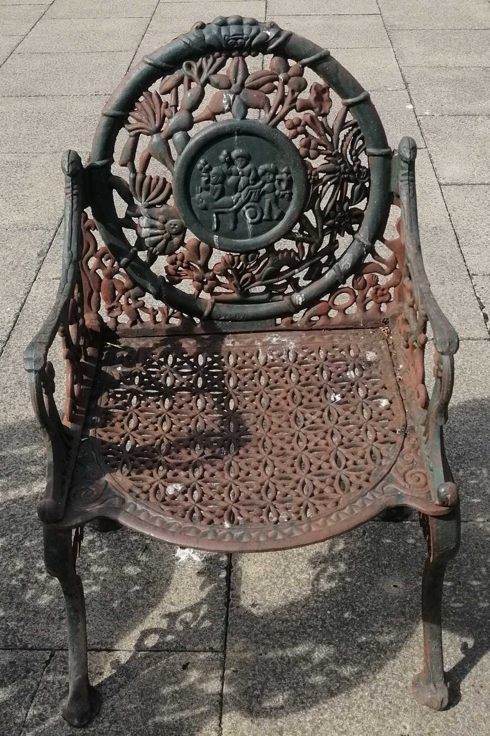 Lot 1101 A cast iron garden chair, possibly Spanish