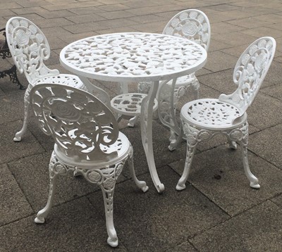 Lot 1107 - A white painted cast metal garden table and a...