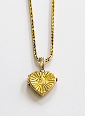 Lot 170 - A 9 carat gold heart shaped locket pendant on...