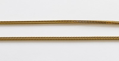Lot 190 - A fancy link chain, stamped '750', length 61cm