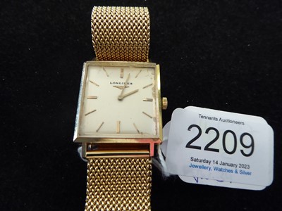 Lot 2209 - Longines: An 18 Carat Gold Wristwatch, signed...