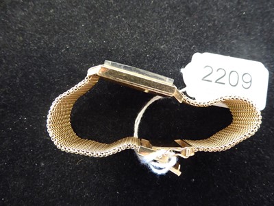 Lot 2209 - Longines: An 18 Carat Gold Wristwatch, signed...