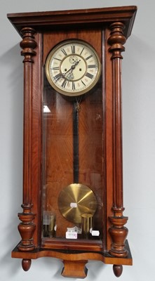 Lot 1119 - A walnut veneered Vienna style striking wall...