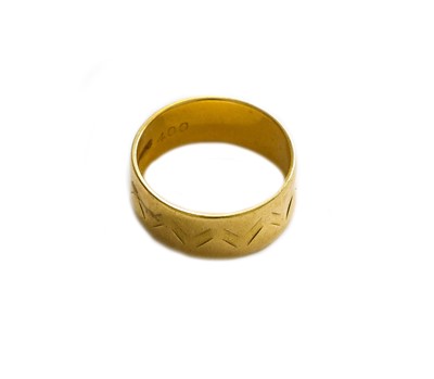 Lot 177 - An 18 carat gold band ring, finger size M