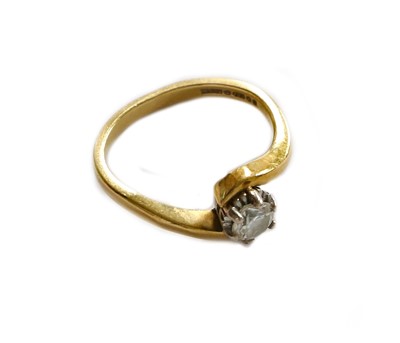 Lot 210 - An 18 carat gold diamond solitaire ring,...