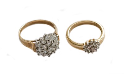 Lot 216 - A 9 carat gold diamond cluster ring, finger...