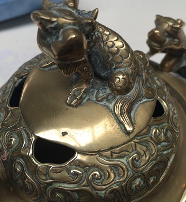 Lot 7 - A Chinese polished bronze ding, early 20th...