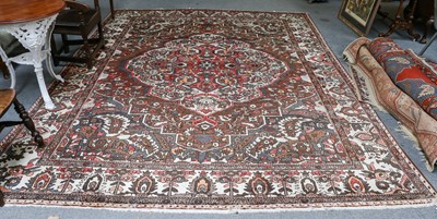 Lot 1003 - A Bakhtiari carpet, the walnut brown field of...