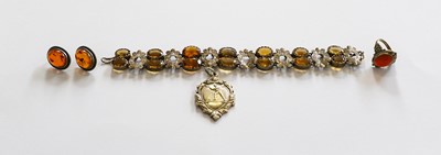 Lot 232 - A citrine bracelet, stamped 'STERLING', length...