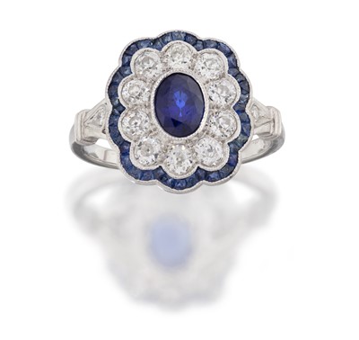 Lot 2106 - A Sapphire and Diamond Cluster Ring