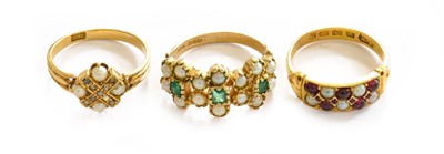 Lot 203 - A 9 carat gold emerald and split pearl cluster...