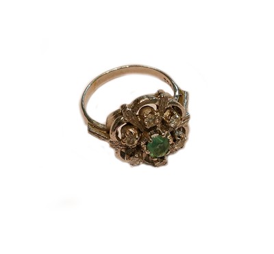 Lot 240 - An emerald and diamond cluster ring, stamped...