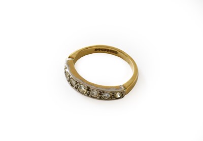 Lot 113 - A 9 carat gold diamond seven stone ring,...