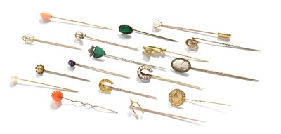 Lot 406 - Seventeen Stickpins, including a diamond...