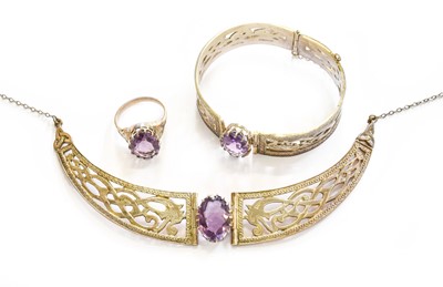 Lot 191 - A silver amethyst necklace, bangle and ring...
