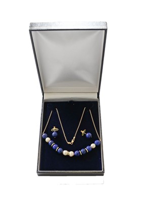 Lot 164 - A lapis lazuli, cultured pearl and diamond...