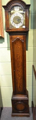 Lot 393 - An oak grandmother clock