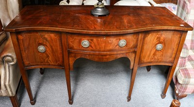 Lot 1240 - A George III mahogany serpentine fronted...