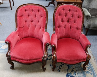 Lot 1189 - A pair of Victorian buttoned chairs with...