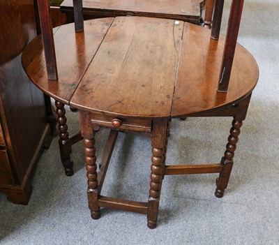 Lot 1149 - An early 19th century oak gate leg table (a/f),...