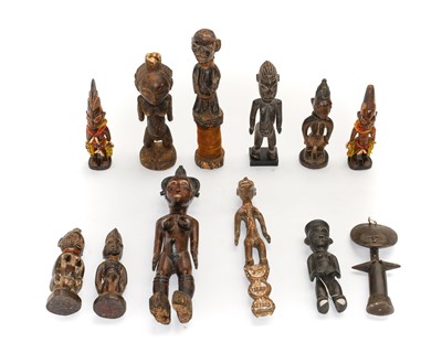 Lot 2397 - A Collection of Twelve Various African Figures,...