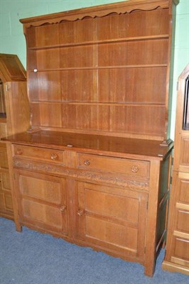 Lot 407 - A blonde oak dresser