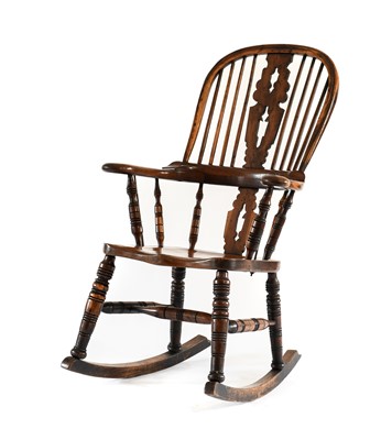 Lot 763 - A Mid 19th Century Yewwood Rocking Chair, with...