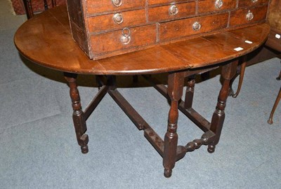 Lot 425 - An early 18th century oak gateleg table