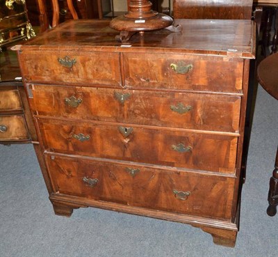 Lot 437 - An early 18th century walnut five drawer straight fronted chest of drawers