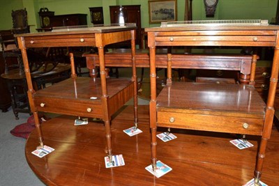 Lot 439 - A pair of mahogany bedside tables, each with brass three quarter gallery and brushing slide