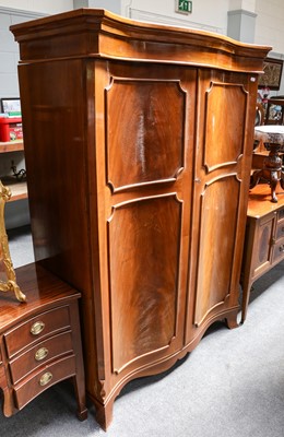 Lot 1215 - A serpentine fronted mahogany and walnut...