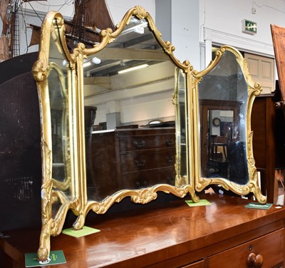 Lot 1117 - A gilt framed trypych mirror in the Rococo...