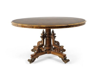 Lot 1221 - A Victorian Figured Walnut and Crossbanded Oval Loo Table, 3rd quarter 19th century, raised on...