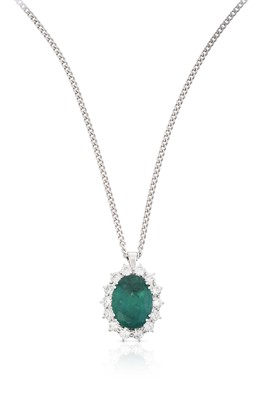 Lot 2297 - An 18 Carat White Gold Emerald and Diamond Cluster Pendant on Chain